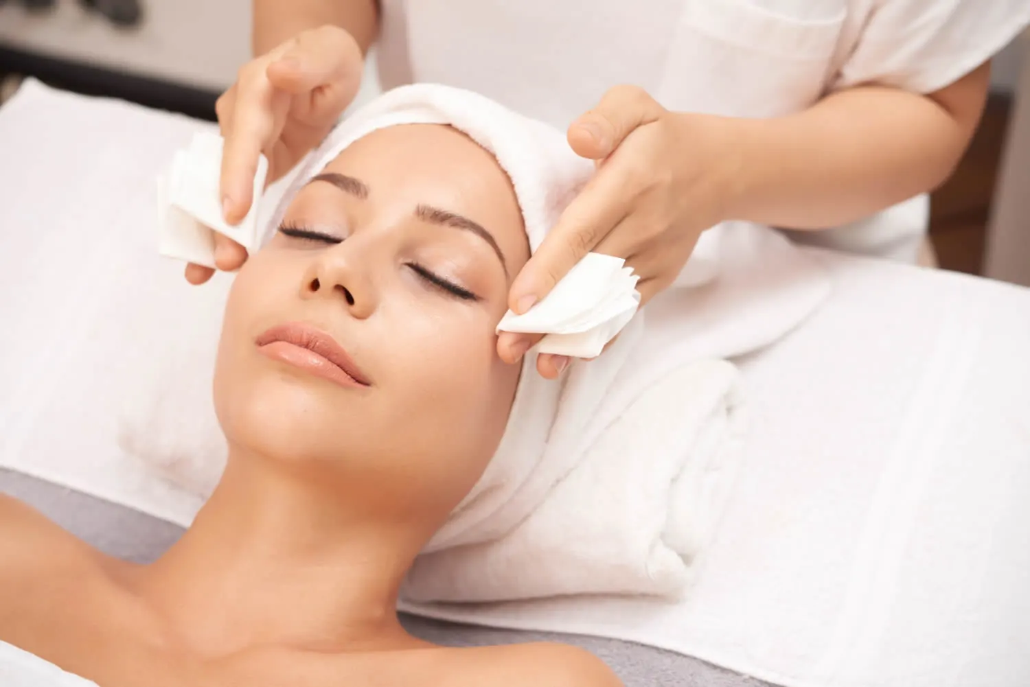 medical dermatology woman woman-receiving-facial